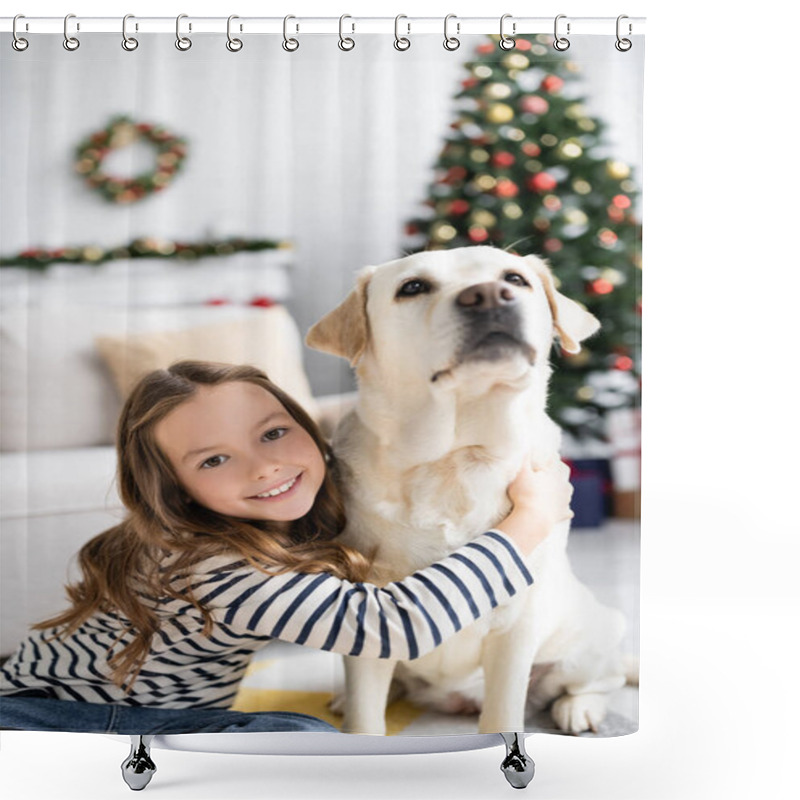 Personality  Girl Smiling At Camera While Hugging Labrador Near Blurred Christmas Tree At Home  Shower Curtains