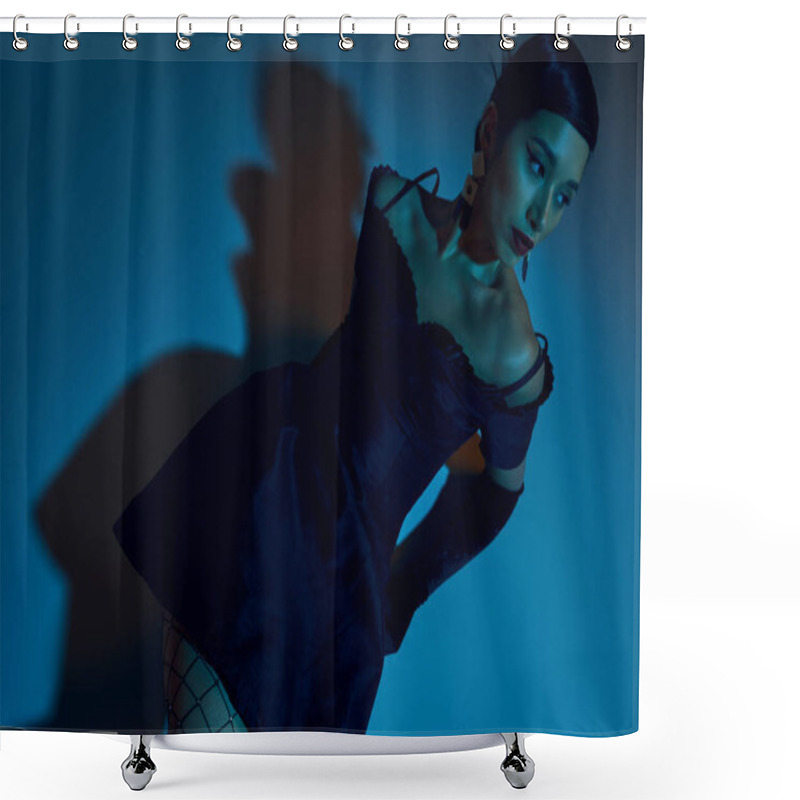 Personality  High Angle View Of Appealing Asian Woman With Brunette Hair, In Black Cocktail Dress And Long Gloves Looking Away While Sitting On Blue Background With Cyan Lighting Effect Shower Curtains