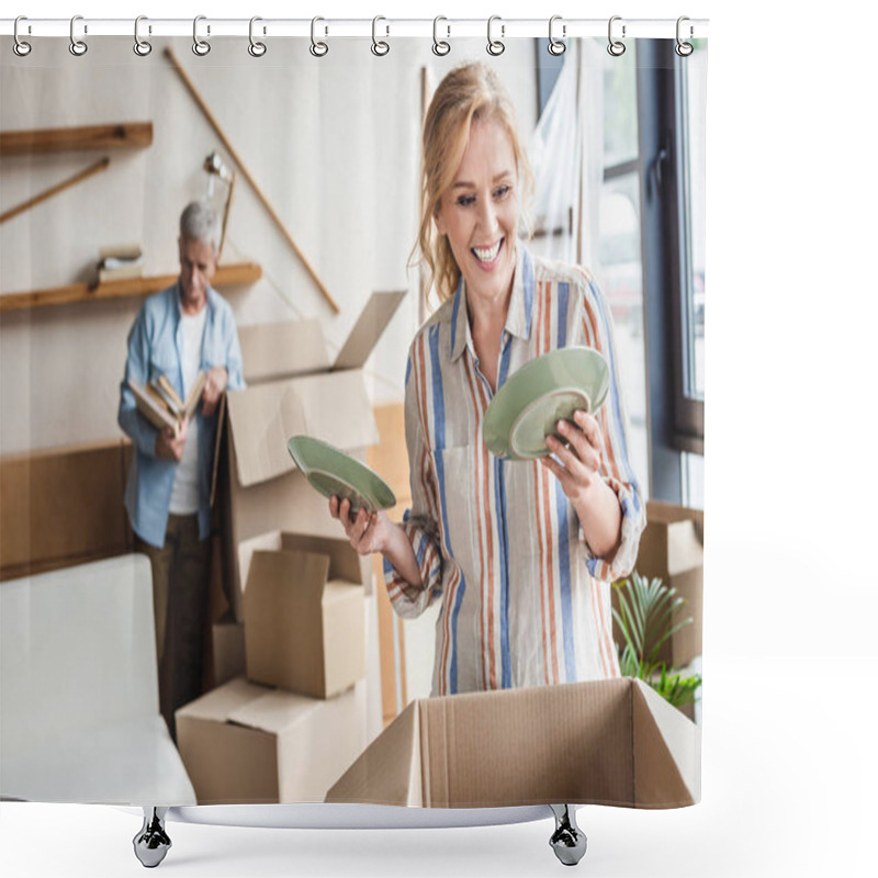 Personality  Smiling Woman Packing Plates And Husband Standing Behind During Relocation  Shower Curtains