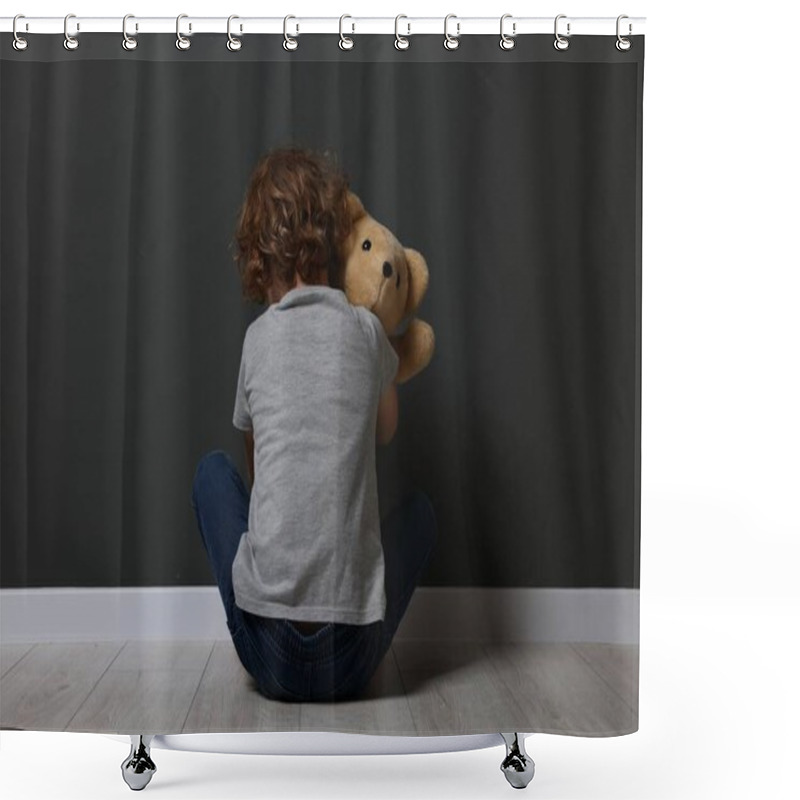 Personality  Child Abuse. Upset Boy With Toy Sitting On Floor Near Grey Wall, Back View Shower Curtains