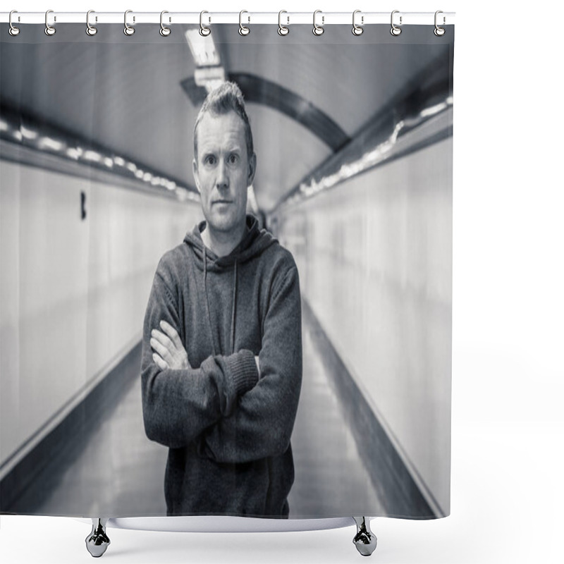 Personality  Portrait Of Young Man Feeling Desperate And Lonely Standing In Subway Walkway Wearing A Hood Thinking In Stress And Depressed. Shower Curtains