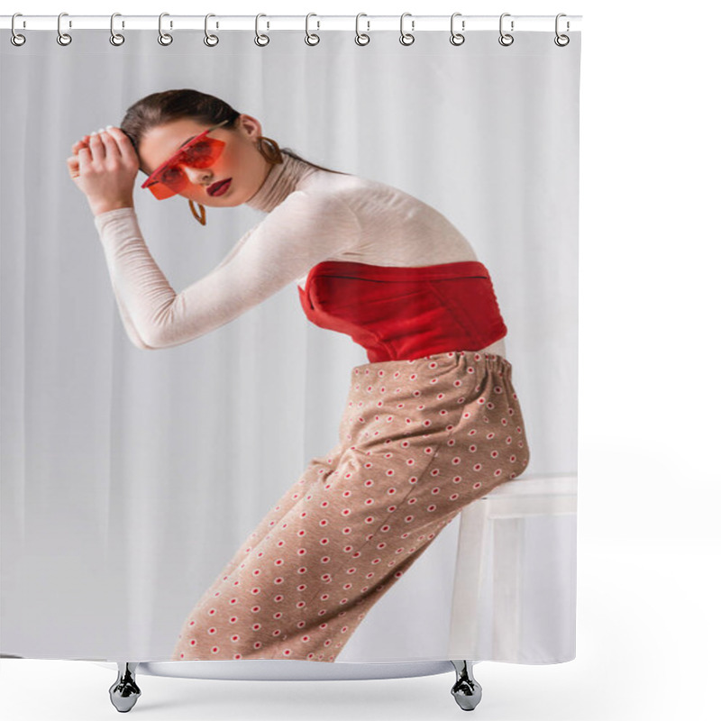 Personality  Fashionable Girl Looking At Camera And Holding Hands Near Head While Sitting On Stool Isolated On Grey Shower Curtains