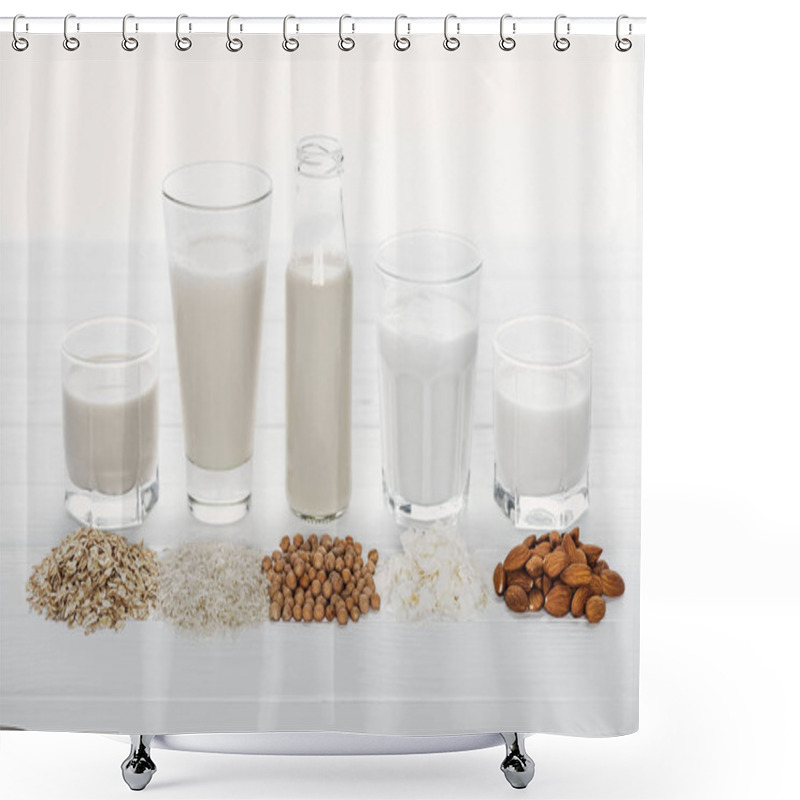 Personality  Glasses And Bottle With Coconut, Chickpea, Oat, Rice And Almond Milk On White Wooden Surface With Ingredients Isolated On White Shower Curtains