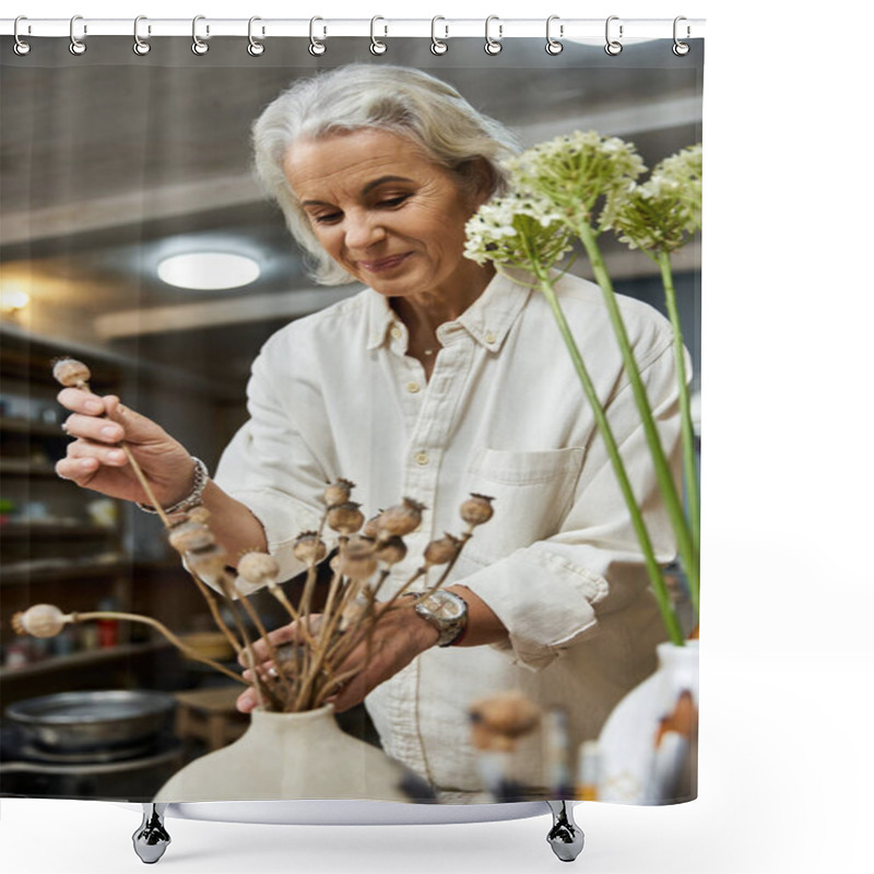 Personality  A Graceful Woman Thoughtfully Places Dried Blooms Into A Rustic Vase, Exuding Calm And Creativity. Shower Curtains