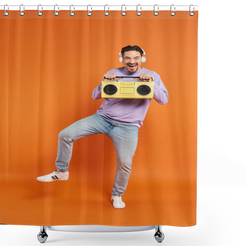 Personality  Cheerful Bearded Man In Purple Sweater And Wireless Headphones Holding Boombox On Orange Background Shower Curtains