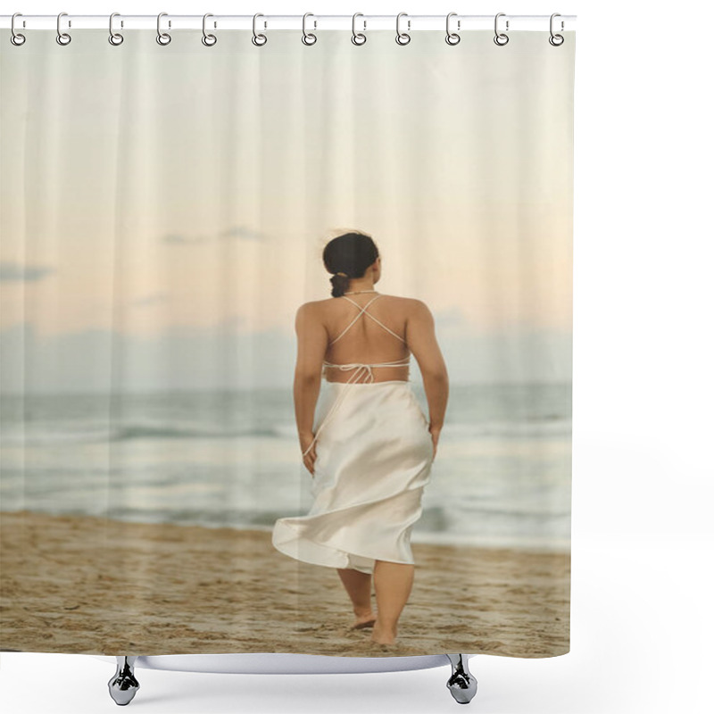 Personality  A Woman In A Flowing White Dress Walks Barefoot On A Sandy Beach In Miami, The Sun Setting In The Distance. Shower Curtains