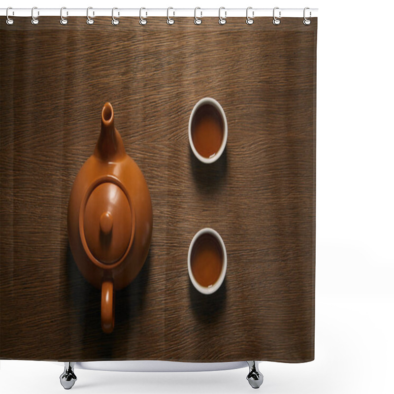 Personality  Top View Of Brown Ceramic Chinese Teapot And Cups Of Tea On Wooden Table Shower Curtains