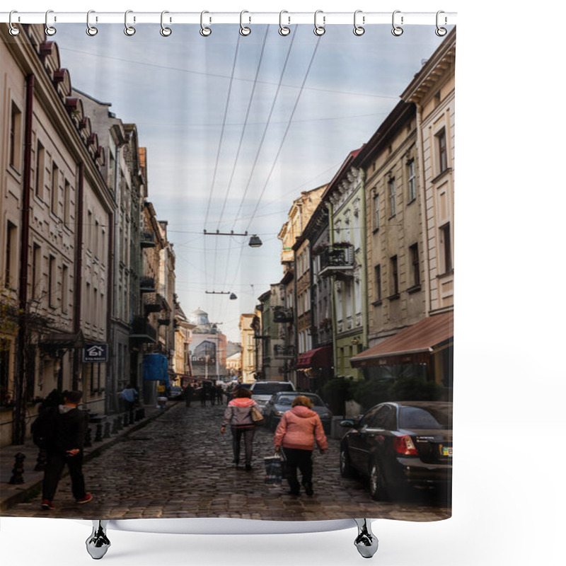 Personality  LVIV, UKRAINE - OCTOBER 23, 2019: Parked Cars And People Walking Near House With Cyrillic Lettering On Signboard  Shower Curtains