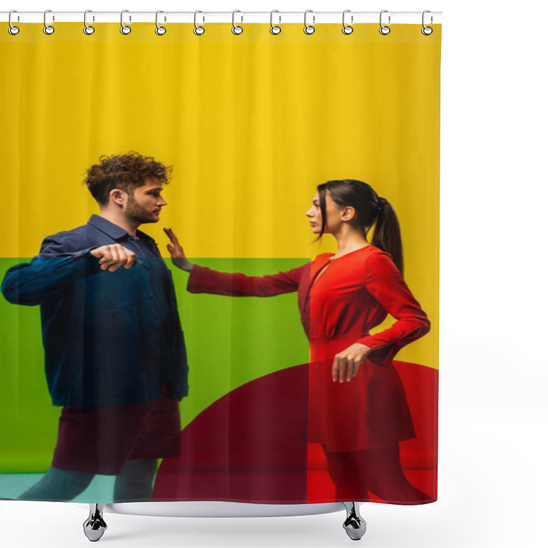 Personality  Brunette Woman Showing Stop To Curly Man And Holding Different Shapes Glass Isolated On Yellow Shower Curtains