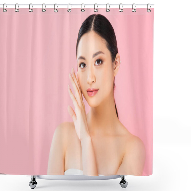 Personality  Young Asian Woman Looking At Camera And Touching Face Isolated On Pink Shower Curtains