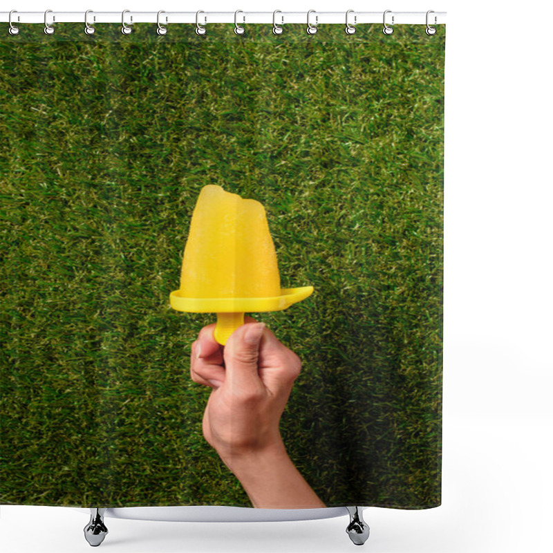 Personality  Sweet Fruit Popsicle In Hand On Green Grass Background Shower Curtains