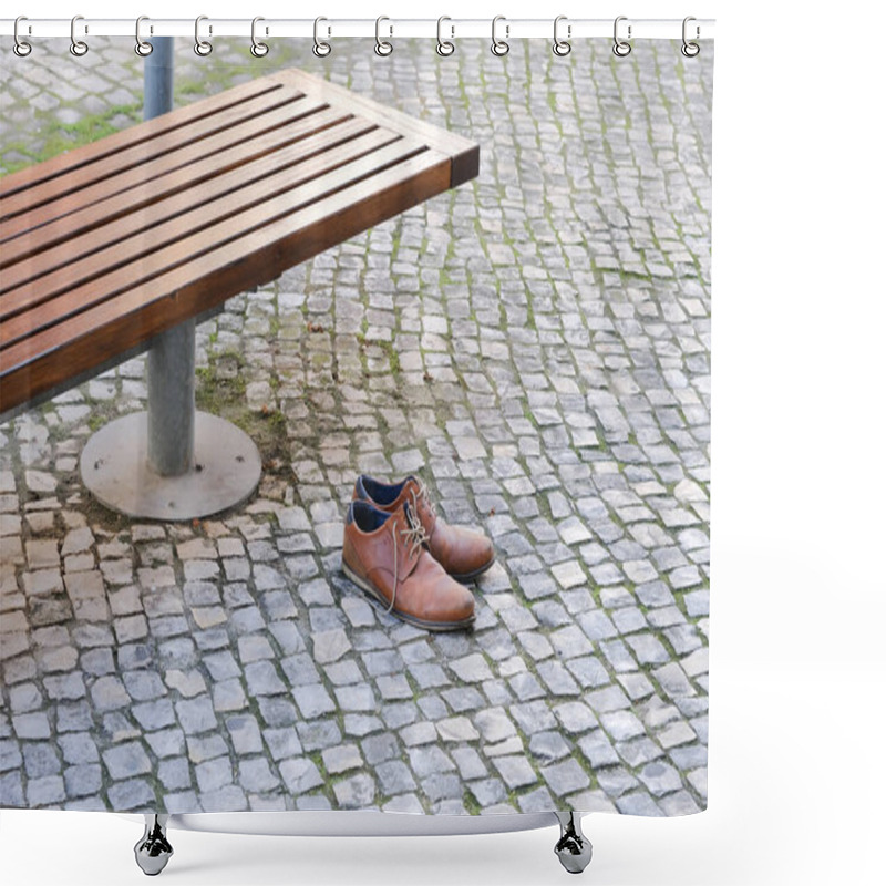 Personality  Brown Leather Shoes On A Cobblestone Pavement Next To A Bench In An Urban Setting. Shower Curtains