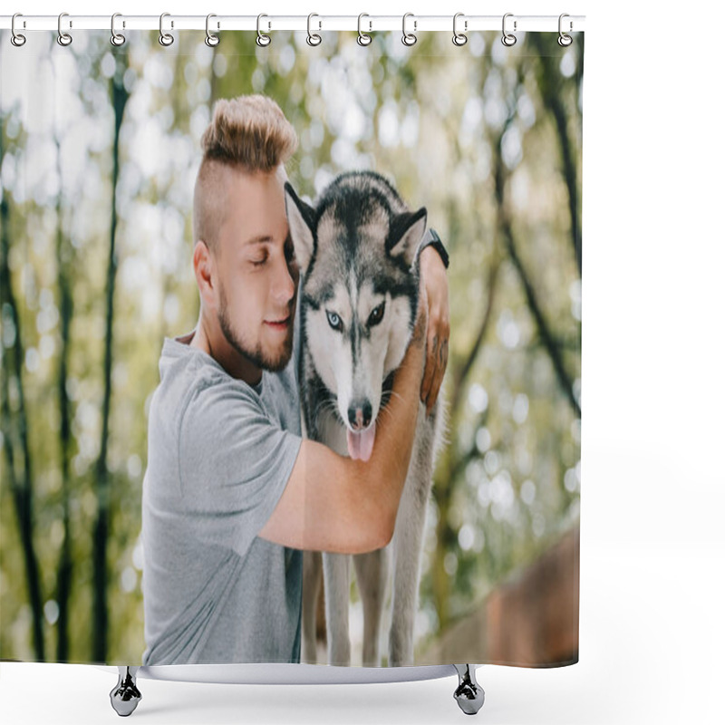 Personality  Young Man Hugging Husky Dog In Park Shower Curtains