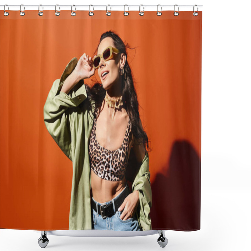 Personality  A Stylish Woman Wearing A Leopard Print Top And Jeans, Exuding Confidence And Summertime Fashion On An Orange Studio Background. Shower Curtains