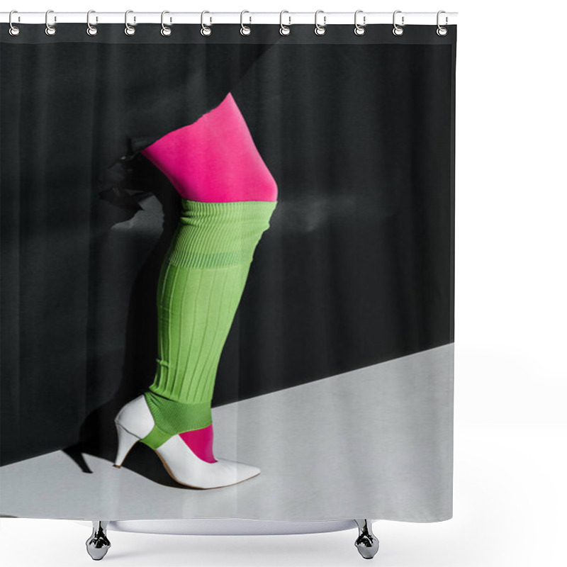 Personality  Cropped Image Of Woman Showing Leg In Pink Tights, Green Gaiter And White High Heel Through Black Paper Shower Curtains