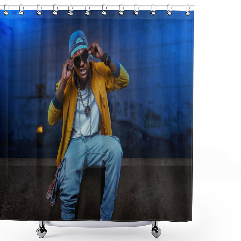 Personality  Black Rapper In Cap And Sunglasses Poses In Underpass, Singer In Grunge Subway. Rap Performer On Scene With Lights, Underground Music, Urban Style Shower Curtains