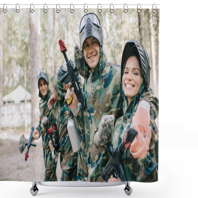 Personality  Smiling Young Male Paintballer Embracing Female Teammate In Camouflage With Paintball Gun Outdoors  Shower Curtains