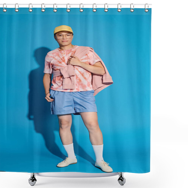 Personality  A Young Man, Stylishly Dressed In A Pink Shirt And Blue Shorts, Poses Energetically Against A Blue Backdrop. Shower Curtains