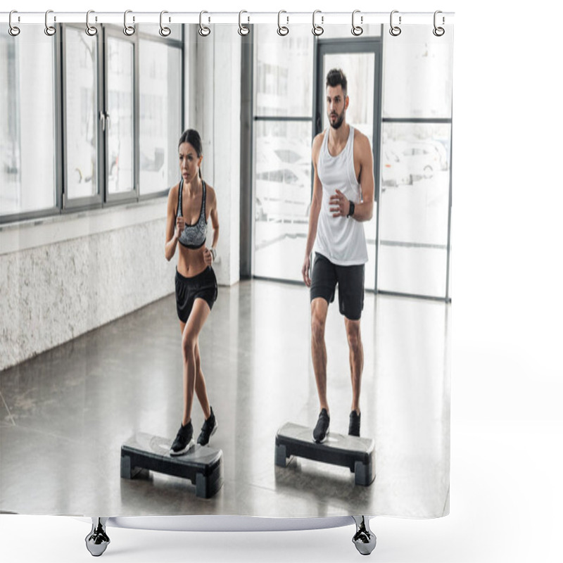 Personality  Muscular Young Man And Beautiful Sporty Girl Exercising Together On Step Platforms In Gym  Shower Curtains