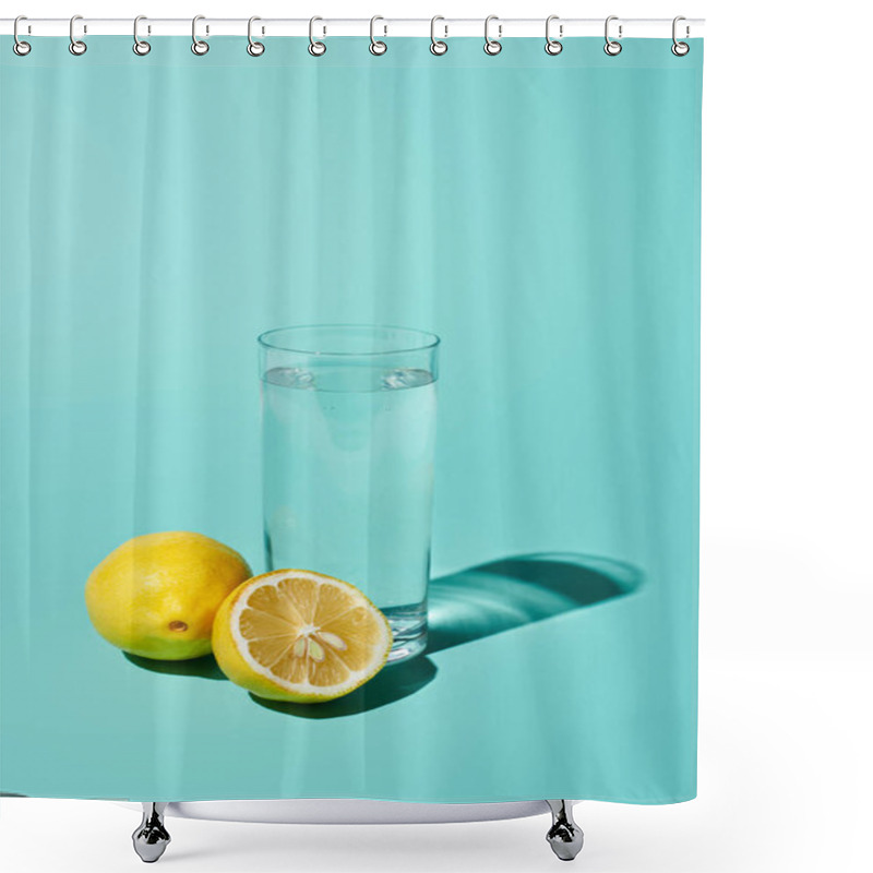 Personality  Transparent Glass With Fresh Water And Bright Lemon On Turquoise Background Shower Curtains