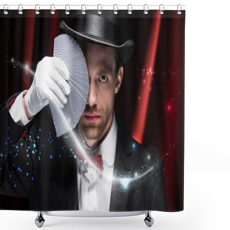 Personality  KYIV, UKRAINE - NOVEMBER 27, 2019: Professional Magician Holding Playing Cards In Circus With Red Curtains And Glowing Illustration Shower Curtains