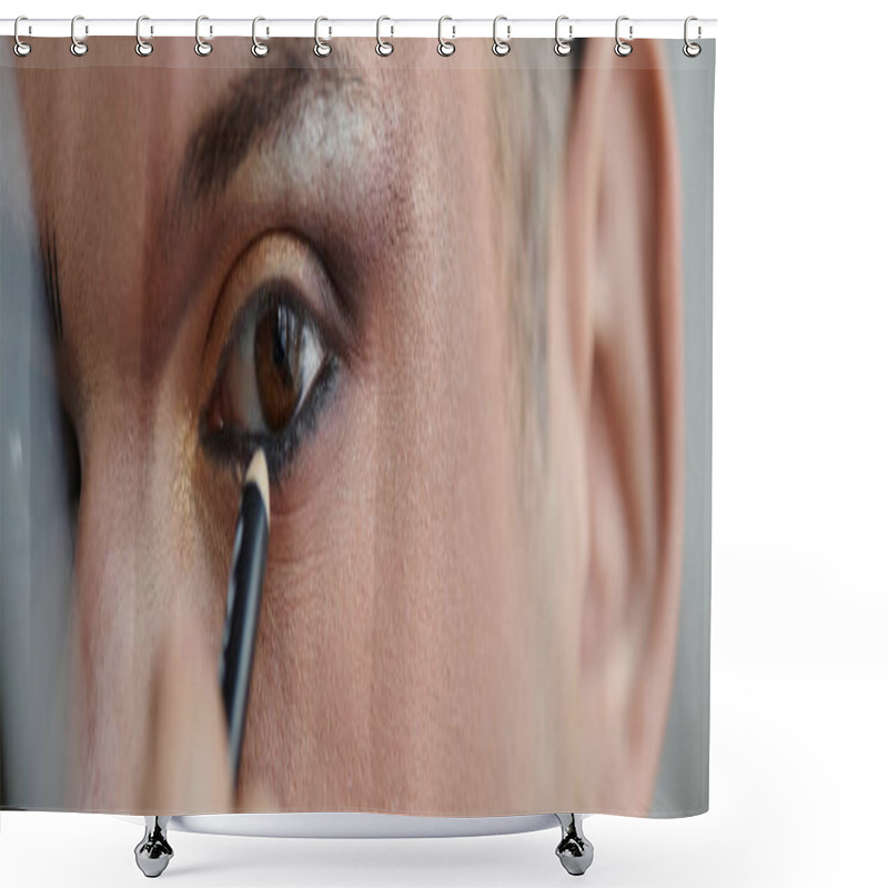 Personality  A Queer Person Is Applying Eyeliner To Their Upper Lash Line, Creating A Dramatic And Fashionable Look. Shower Curtains