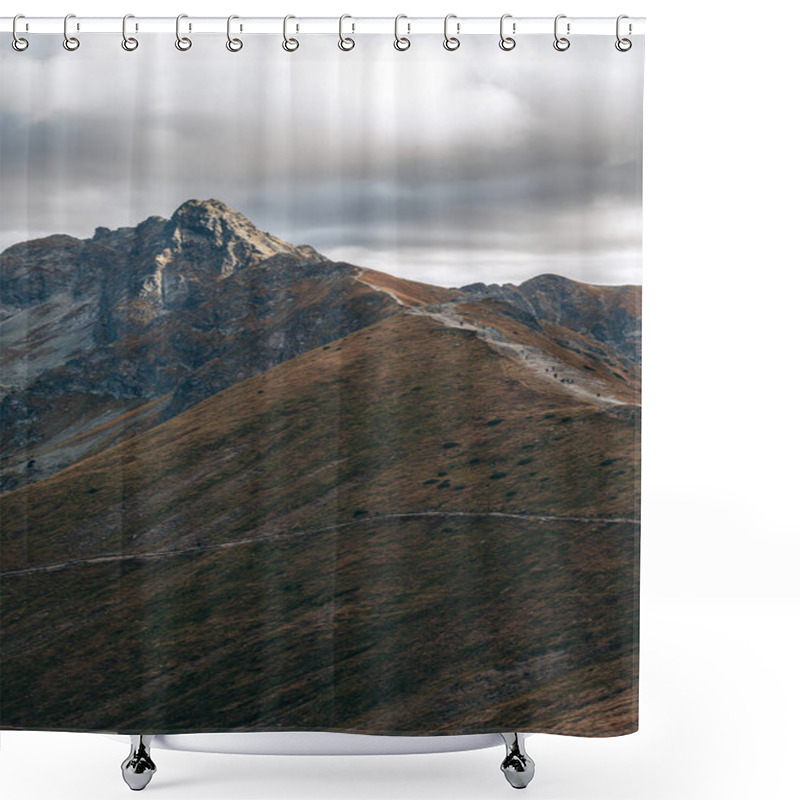 Personality  A Dramatic Mountain Landscape Featuring A Rugged Peak And Rolling Hills. The Scene Is Illuminated By Soft, Diffused Light Under A Cloudy Sky, Highlighting The Textures Of The Terrain. Shower Curtains