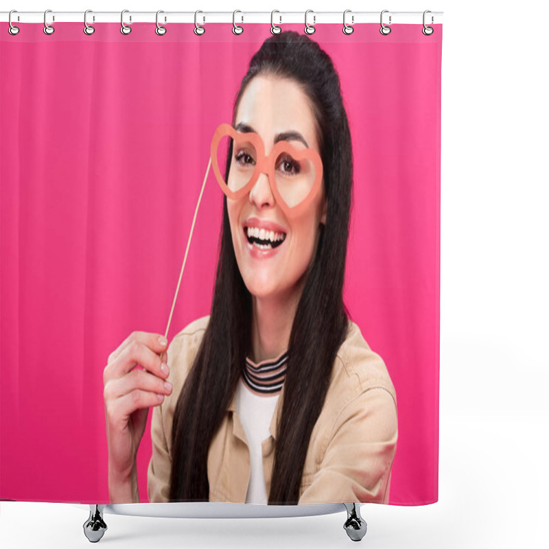 Personality  Happy Young Woman Holding Heart-shaped Eyeglasses On Party Stick And Smiling At Camera Isolated On Pink Shower Curtains