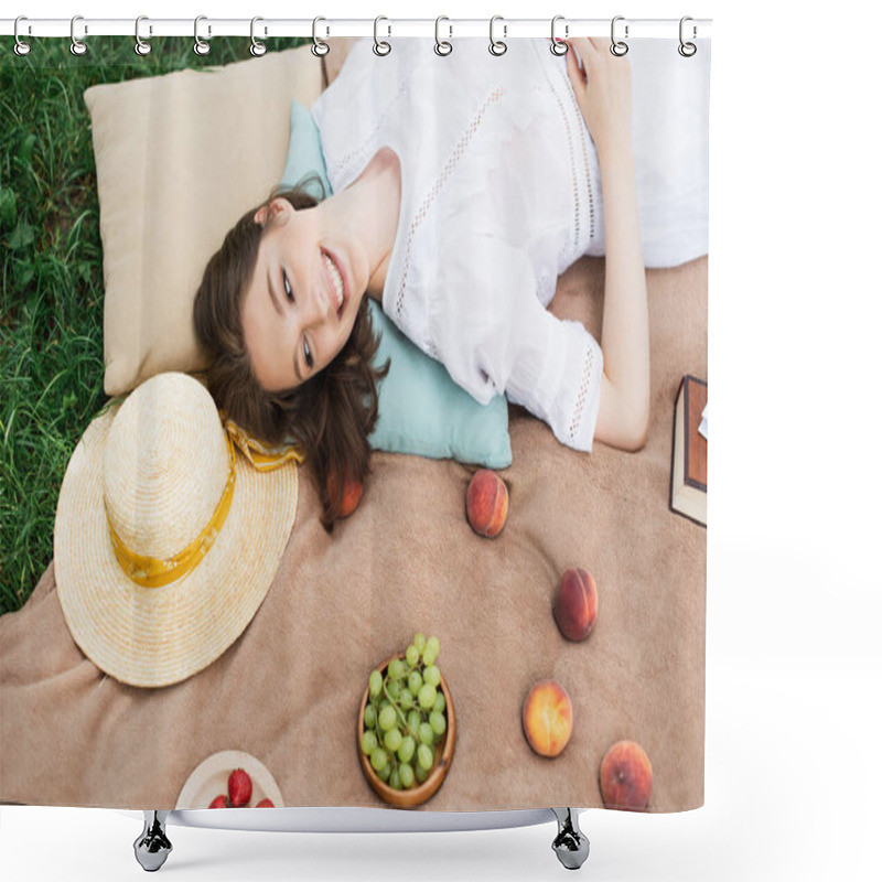 Personality  Top View Of Positive Woman Looking At Fresh Fruits Near Straw Hat On Picnic Blanket  Shower Curtains