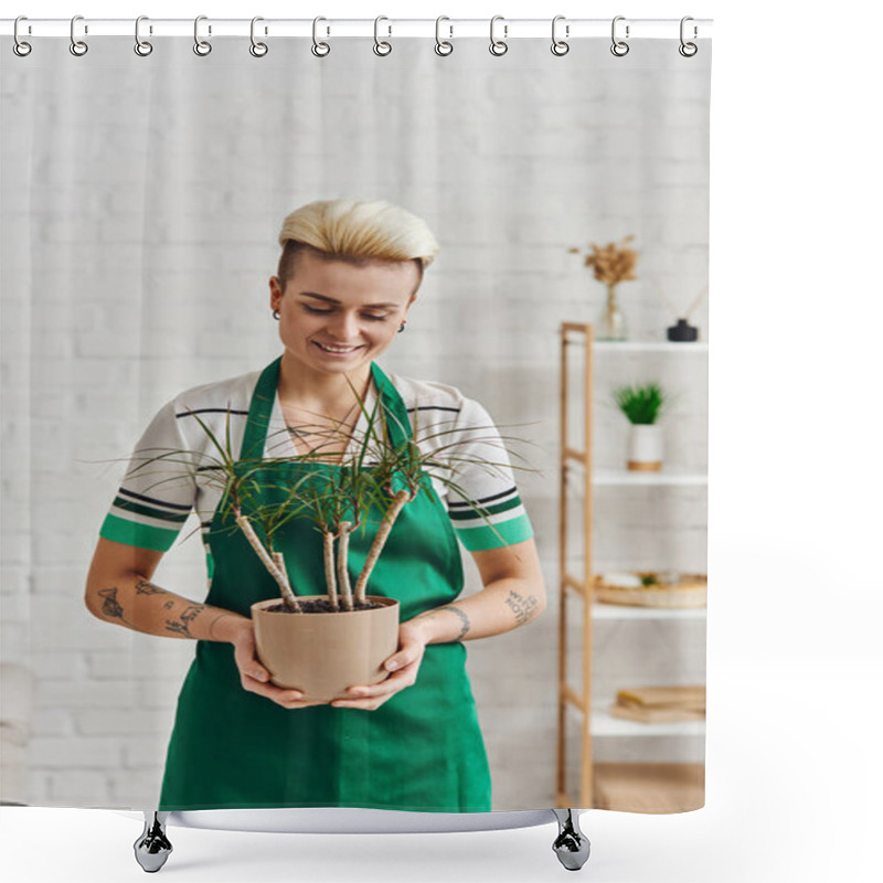 Personality  Overjoyed Tattooed Woman With Trendy Hairstyle Holding Potted Exotic Plant While Standing In Green Apron In Modern Living Room, Plant Therapy, Sustainable Home Decor And Green Living Concept Shower Curtains