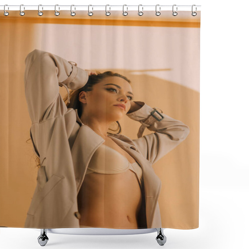 Personality  Low Angle View Of Sexy Girl In Coat And Underwear Touching Hair On Beige Background Shower Curtains