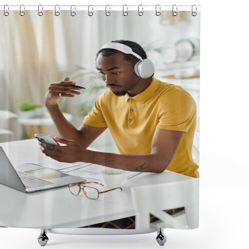 Personality  Focused Young Man Collaborates Remotely, Using His Phone And Laptop In A Bright, Inviting Workspace. Shower Curtains