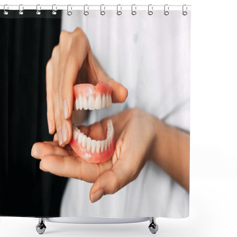 Personality  The Dentist Is Holding Dentures In His Hands. Dental Prosthesis In The Hands Of The Doctor Close-up. Front View Of Complete Denture. Dentistry Conceptual Photo. Prosthetic Dentistry. False Teeth Shower Curtains