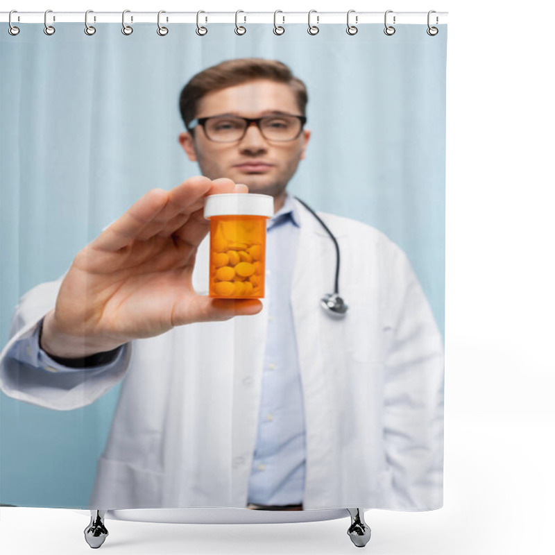 Personality  Bottle With Medication In Hand Of Doctor On Blurred Background Isolated On Blue Shower Curtains