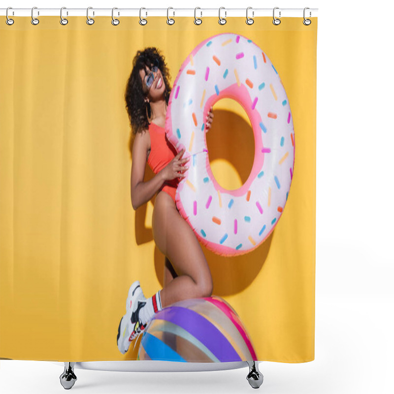 Personality  Brunette African American Woman In Beachwear Holding Swim Ring Near Inflatable Ball On Yellow Background Shower Curtains