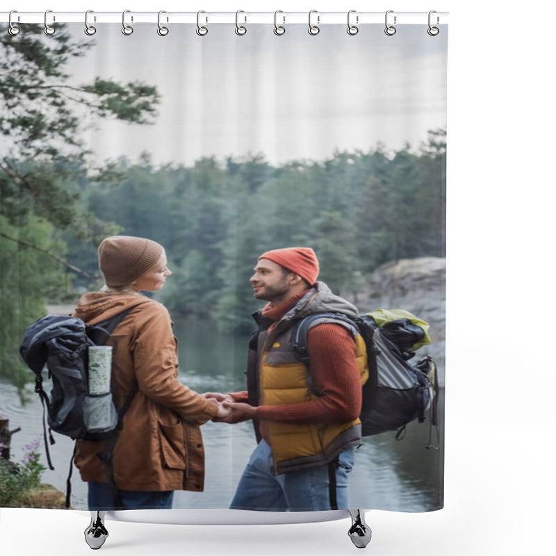 Personality  Young And Joyful Couple Holding Hands While Looking At Each Other Near Lake In Forest  Shower Curtains