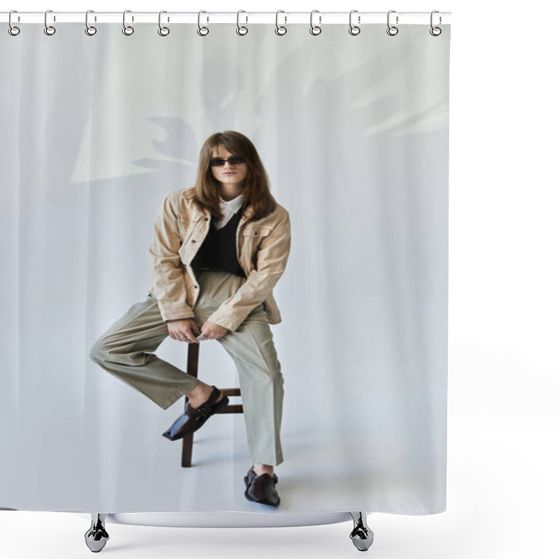 Personality  A Fashionable Young Man Confidently Poses On A Chair, Exuding Modern Style And Charisma. Shower Curtains