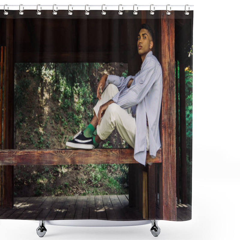 Personality  African American Man In Blue Striped Shirt And Sneakers Sitting In Wooden Patio Shower Curtains