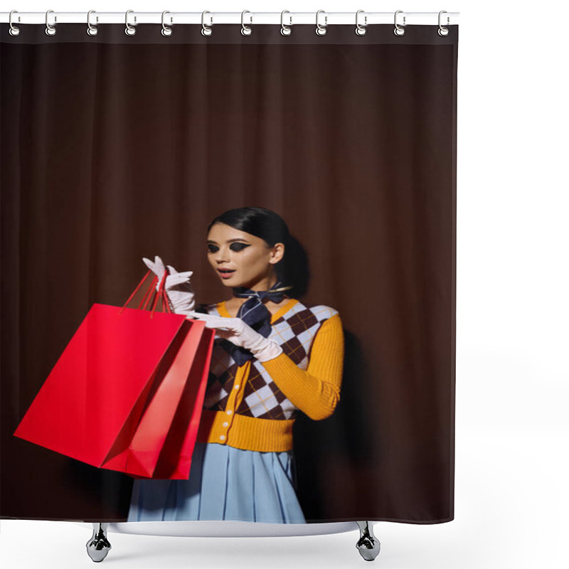 Personality  A Fashionable Young Woman In A Yellow Sweater Looks Excitedly At Shopping Bags In Her Hands. Shower Curtains