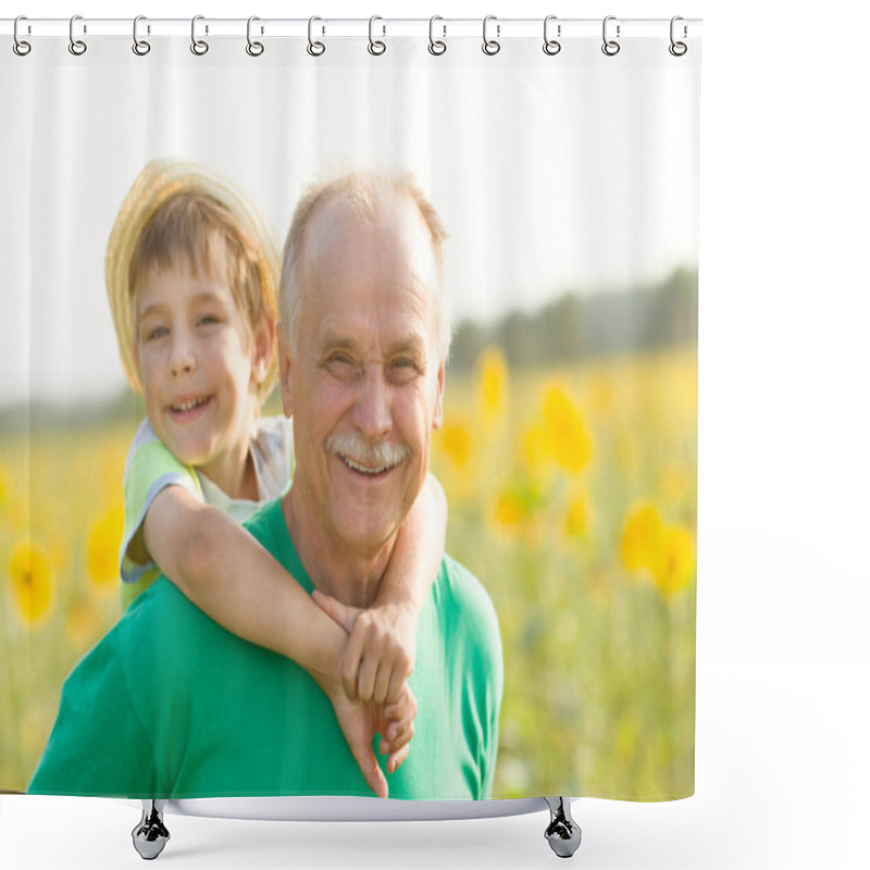 Personality  Grandson Is Sitting On His Grandfather On Walk In The Summer Outdoors In Sunflower Field. Concept Of Friendly Family. Shower Curtains