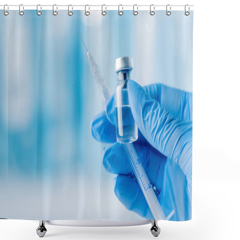 Personality  Doctor's Hand Holding Glass Vial And Syringe With Injection Over Blue Background. Vaccination Or Beauty Therapy Concept. Shower Curtains