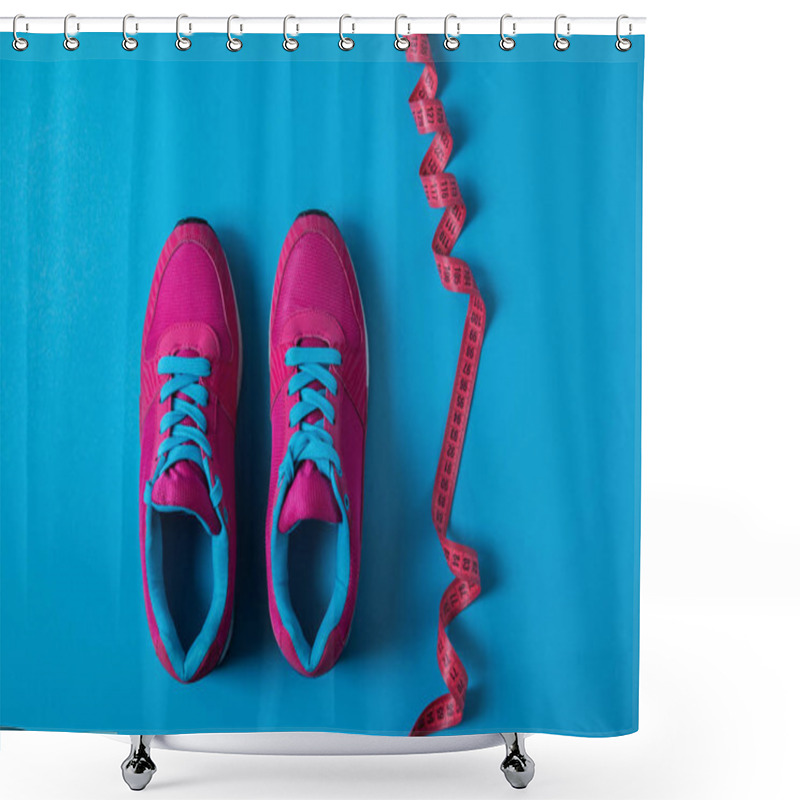 Personality  View From Above Of Pink Sport Shoes And Measuring Tape Isolated On Blue, Minimalistic Concept  Shower Curtains