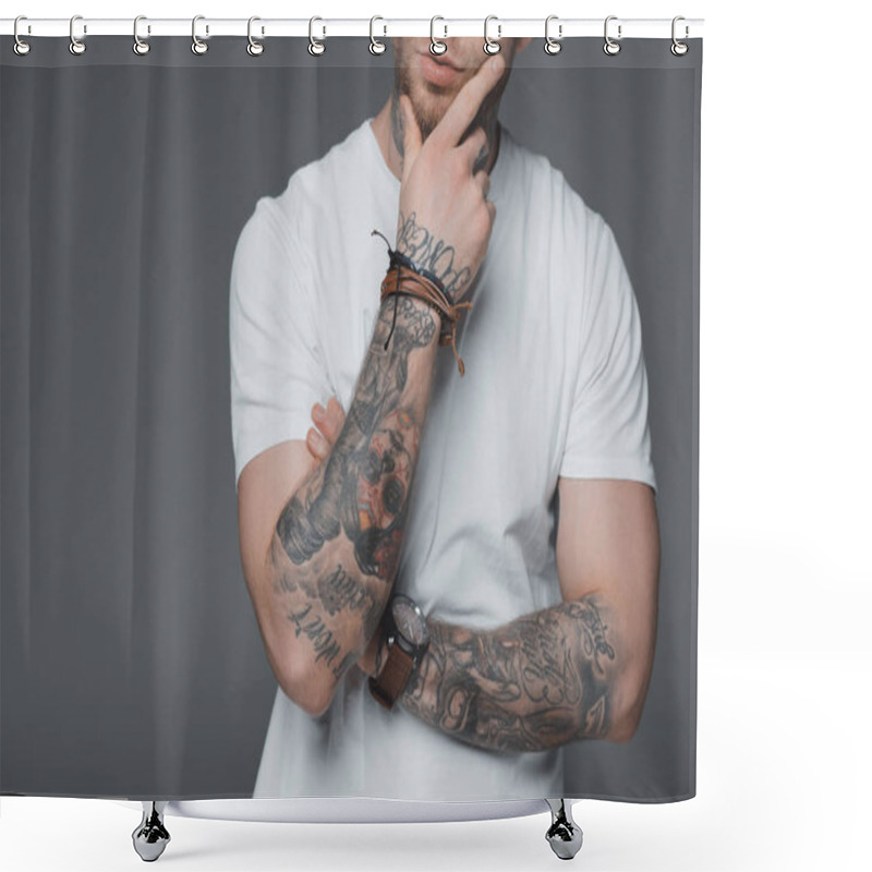 Personality  Cropped Shot Of Stylish Young Tattooed Man In White T-shirt Standing With Hand On Chin Isolated On Grey Shower Curtains