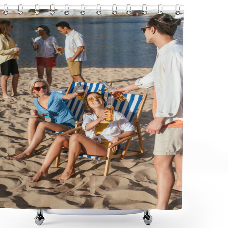 Personality  Young Multicultural Friends Smiling And Drinking Beer While Resting On Beach Shower Curtains