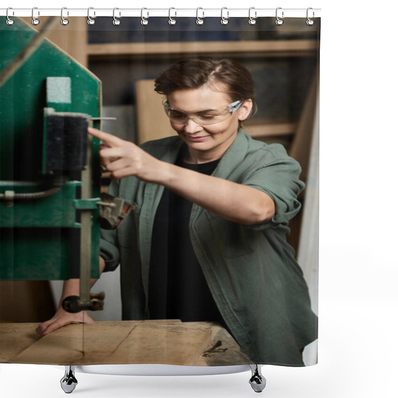 Personality  A Skilled Carpenter Focuses Intently While Working With Machinery In Her Well-equipped Woodshop. Shower Curtains