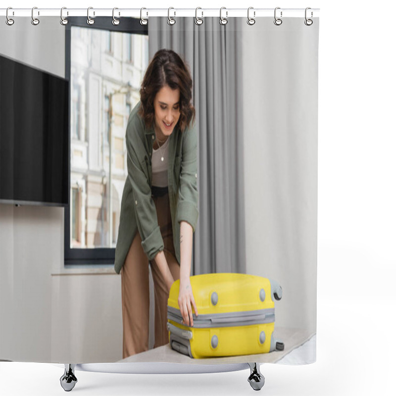 Personality  Traveler In Hotel Room, Smiling Woman With Wavy Brunette Hair Unpacking Yellow Suitcase On Bed Near Window With Grey Curtains And Lcd Tv With Blank Screen In Comfortable Hotel Suite, Modern Interior Shower Curtains