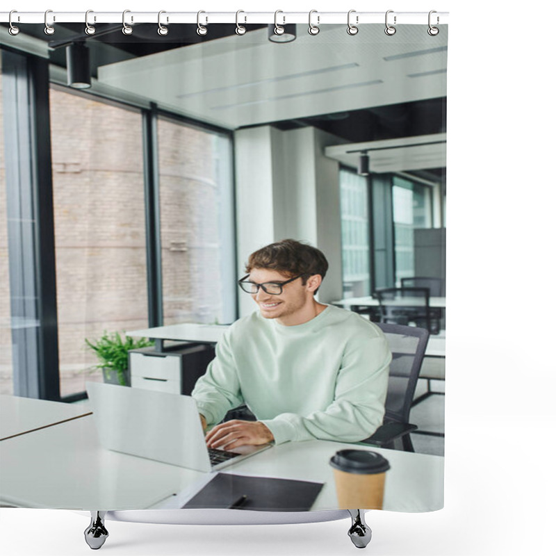 Personality  Cheerful Entrepreneur In Stylish Eyeglasses And Casual Clothes Sitting At Modern Workplace And Networking On Laptop Near Folder And Coffee To Go In Contemporary Office, Successful Business Concept Shower Curtains