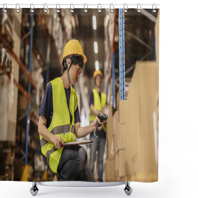 Personality  A Focused Asian Warehouse Worker Scanning Boxes And Taking Inventory With A Clipboard In A Storage Facility. Shower Curtains