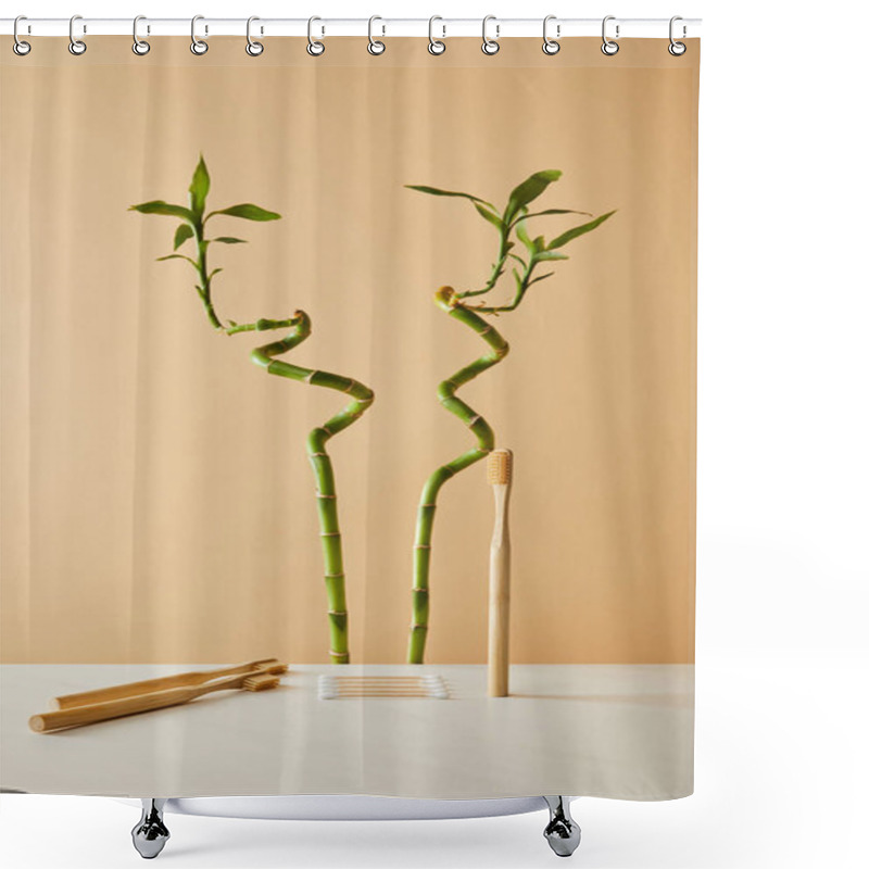 Personality  Bamboo Toothbrush With Ear Sticks On White Table And Green Bamboo On Beige Background Shower Curtains