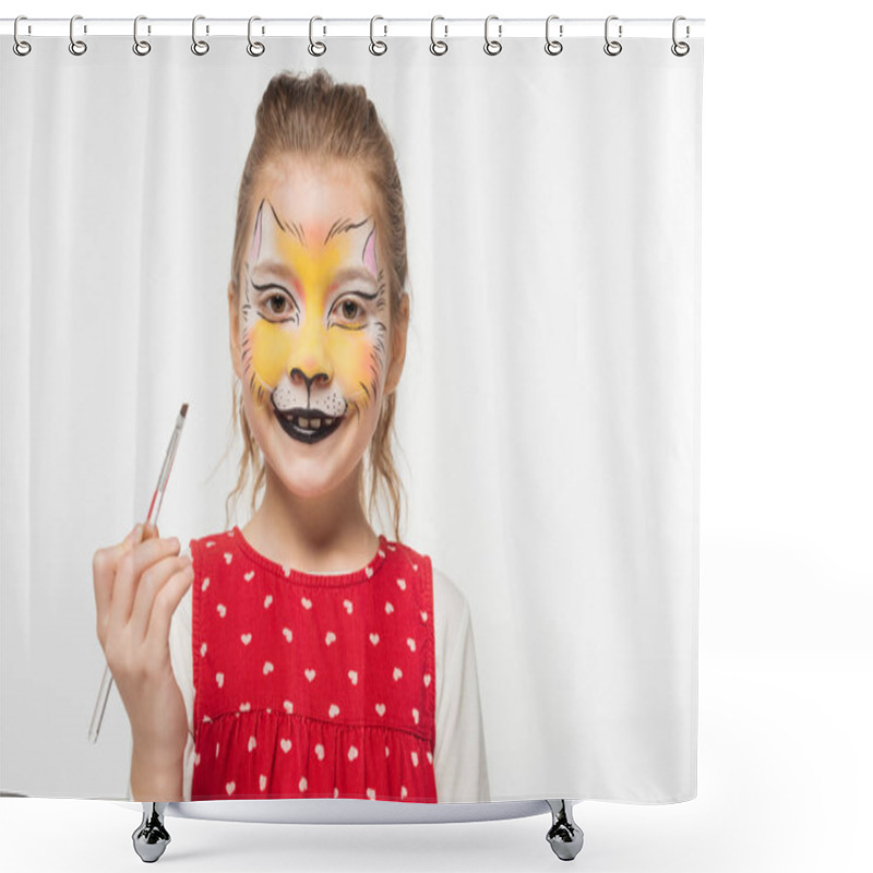 Personality  Smiling Child With Tiger Muzzle Painting On Face Looking At Camera While Holding Paintbrush Isolated On White Shower Curtains